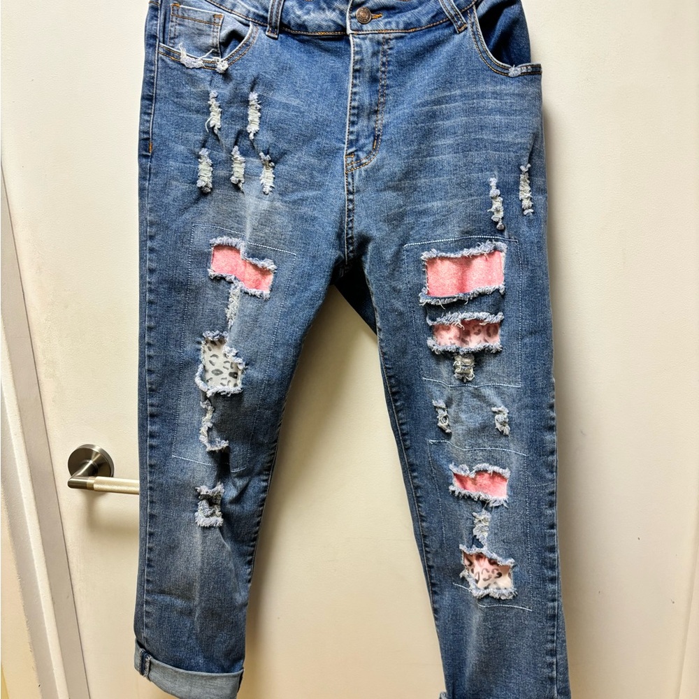 Distressed Blue Jeans with Pink Accents